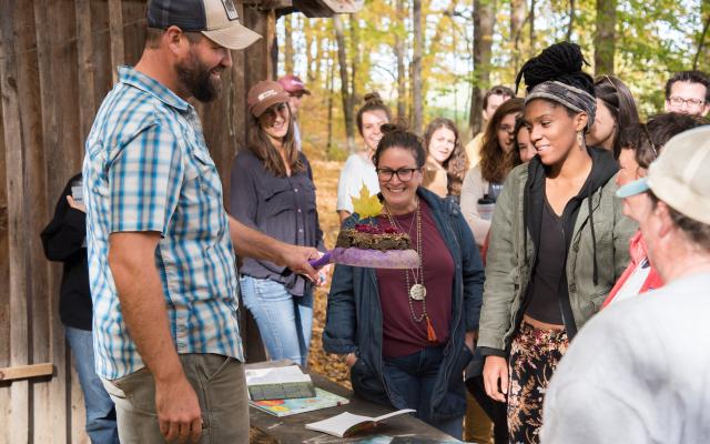 Program participants learn how to make mud pie.