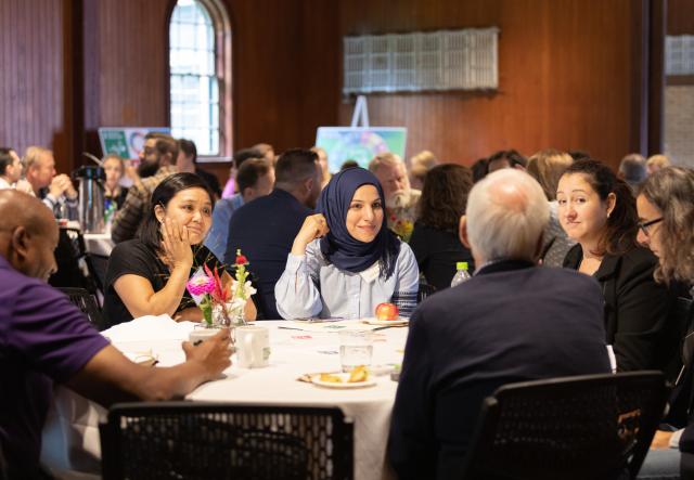 Adults meeting around a table