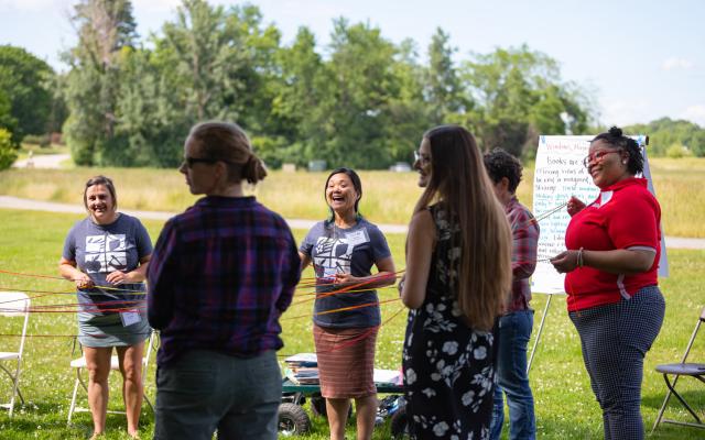 Participants explore "Farm to School in the Classroom with an Equity Lens" as they build a 3D food web mapping the journey of food to cafeteria.