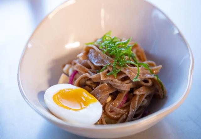 A bowl of Mushroom Broth for Spring Soups & Noodles seen from above.